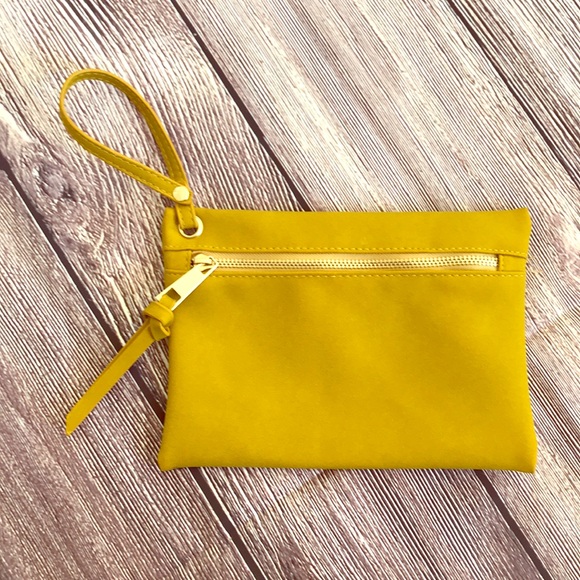 Under One Sky Handbags - Mustard colored Micro suede wristlet